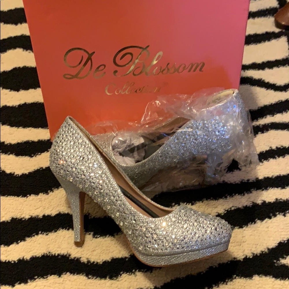 Heels with original packing/box.